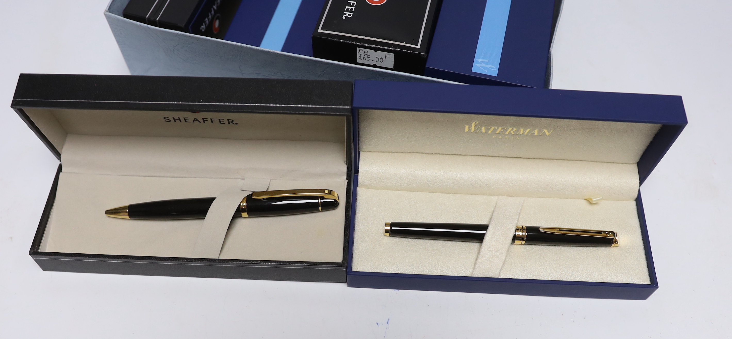 Eight boxed Waterman and Sheaffer pens; two Expert Ballpoint pens, two Hemisphere Ballpoint pens, a Hemisphere Rollerball pen, and three Sheaffer 300 series Ballpoint pens